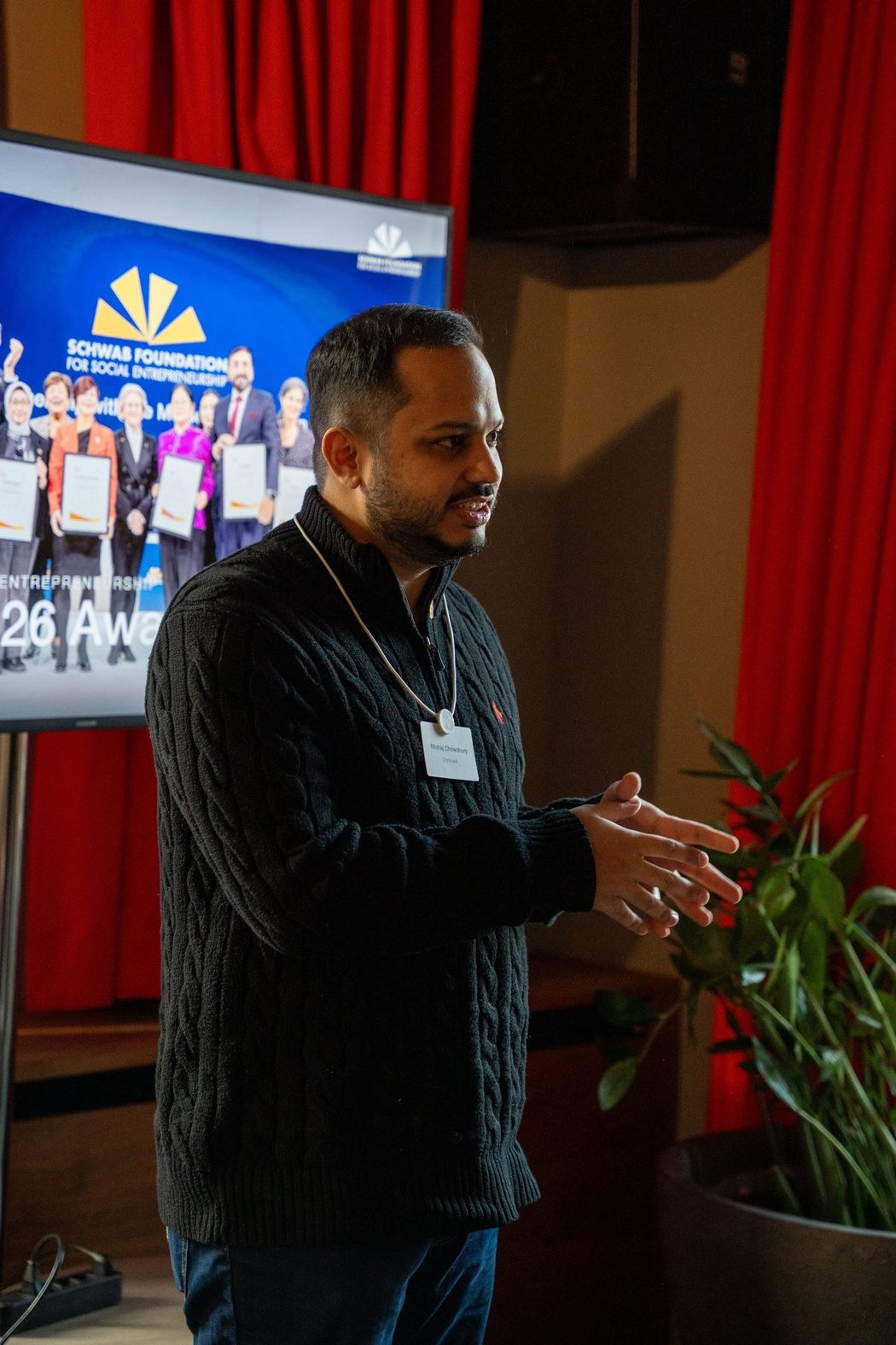 Minhaj Chowdhury speaking to the Schwab Foundation community at its social innovators' gathering, Davos, January 2026.
