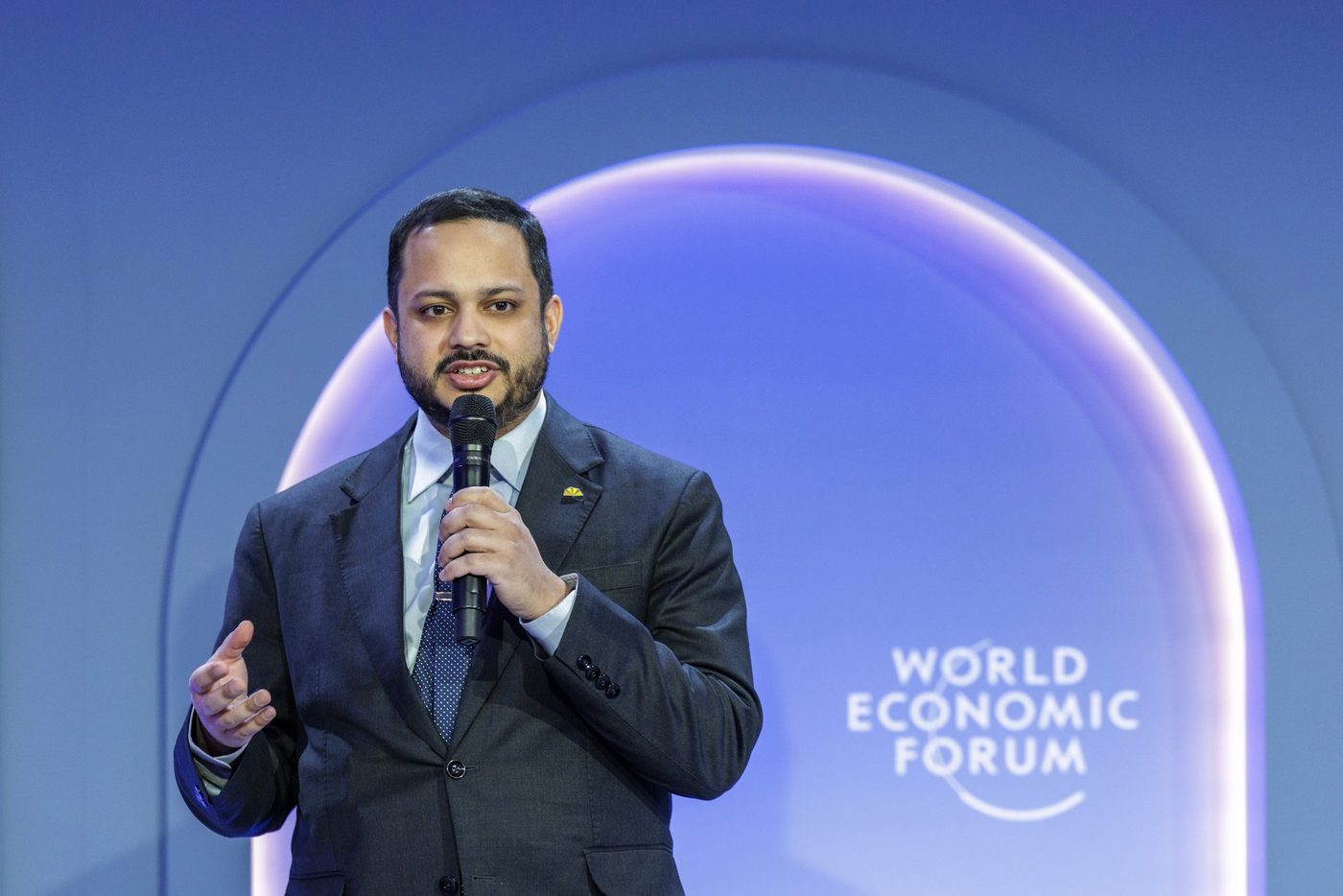 Minhaj Chowdhury speaking on the World Economic Forum stage after receiving the Schwab Foundation award, Davos, 20 January 2026.